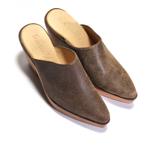 A pair of women's wedge mule shoes in a distressed brown leather finish, shown from a high angle on a white background. The shoes feature a pointed toe and an open back, with the brand name 'Five Worlds' visible on the tan insoles.