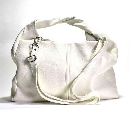 A white shoulder tote bag made of Italian pebbled leather with a cotton lining, featuring a silver colored hardware closure