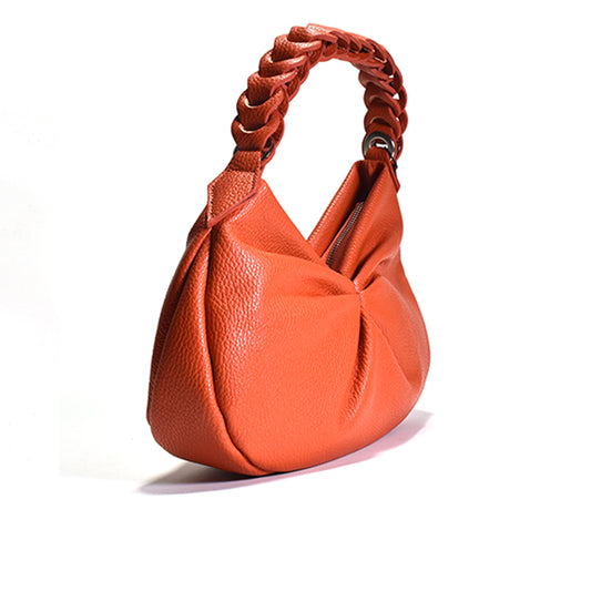 An orange leather shoulder hobo bag with a leather chain link handle.