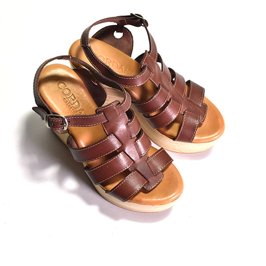 Pair of brown platform sandals with buckles