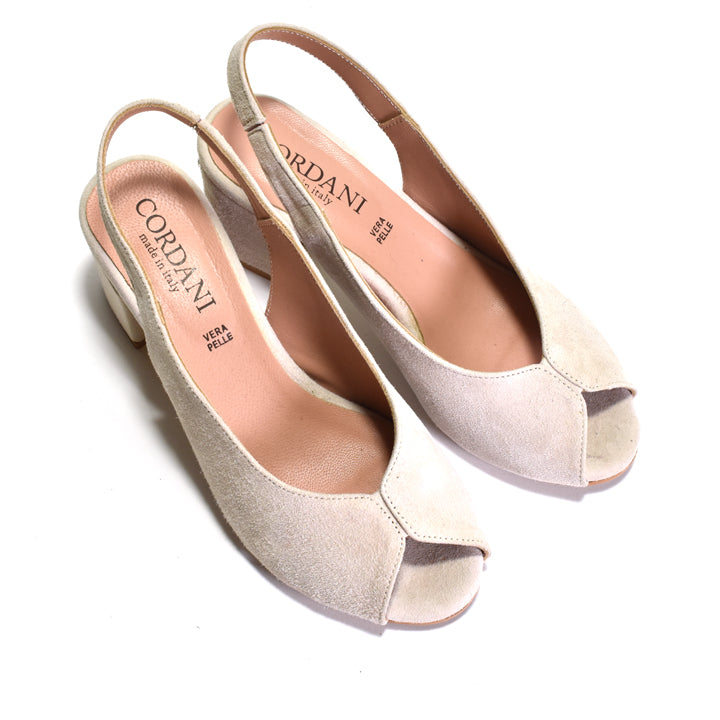 A pair of Cordani brand slingback peep-toe pumps in a light beige suede material, displayed on a clean white background.
