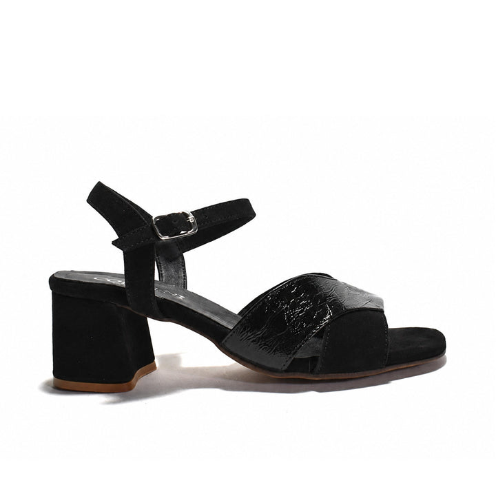 A single black block-heel sandal with an ankle strap and buckle, featuring a textured patent leather toe strap, shown from a side profile on a white background.