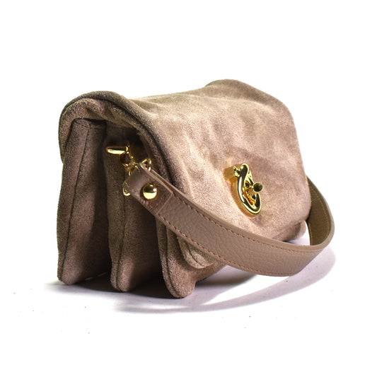 Beige handbag with gold accents on a white background