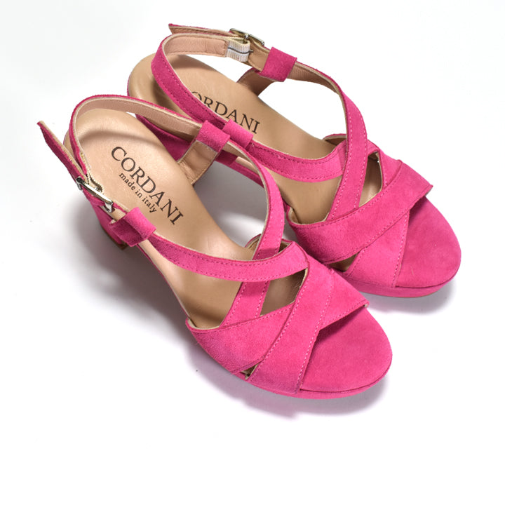 Pair of pink sandals with 'Cordani' branding on a white background