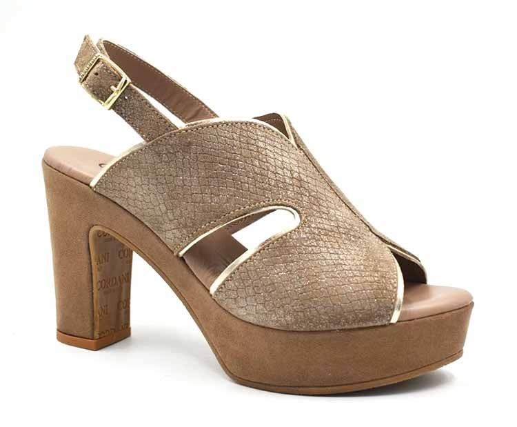 A brown slingback sandal with a wrapped buckle and platform heel. with gold trim