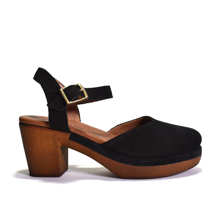 Black suede shoe with wooden block heel on a white background