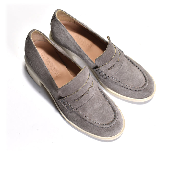Pair of gray loafers on a white background
