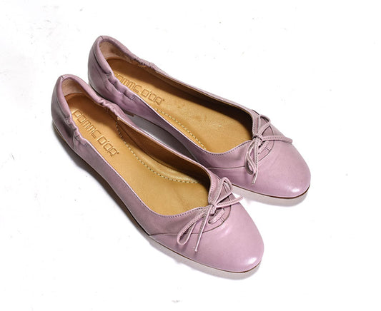 Pair of pink ballet flat with bow
