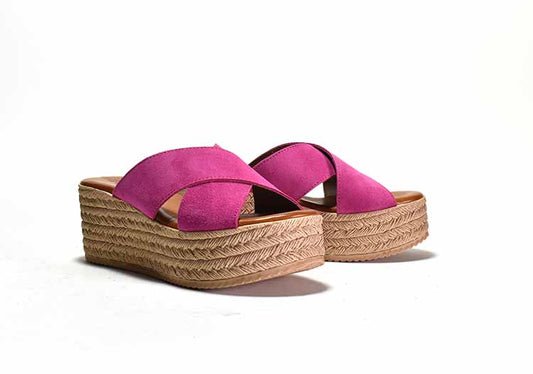 pair of pink and tan platform sandals