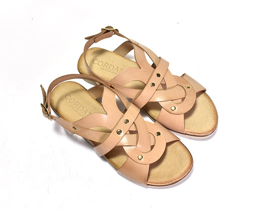 beige Woven strap sandal with sling back on a flexible flat bottom