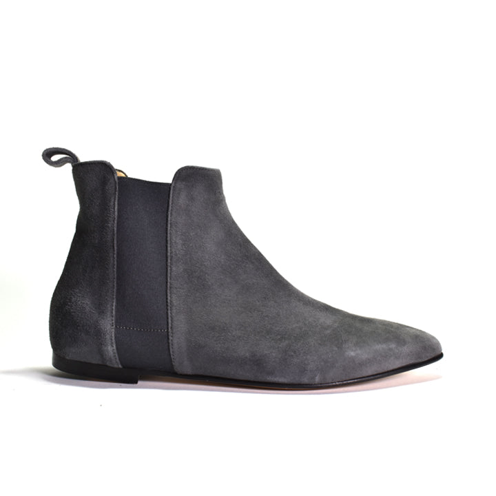 A dark gray suede Chelsea boot with a black elastic side panel and a pull loop at the heel, shown in profile against a white background.