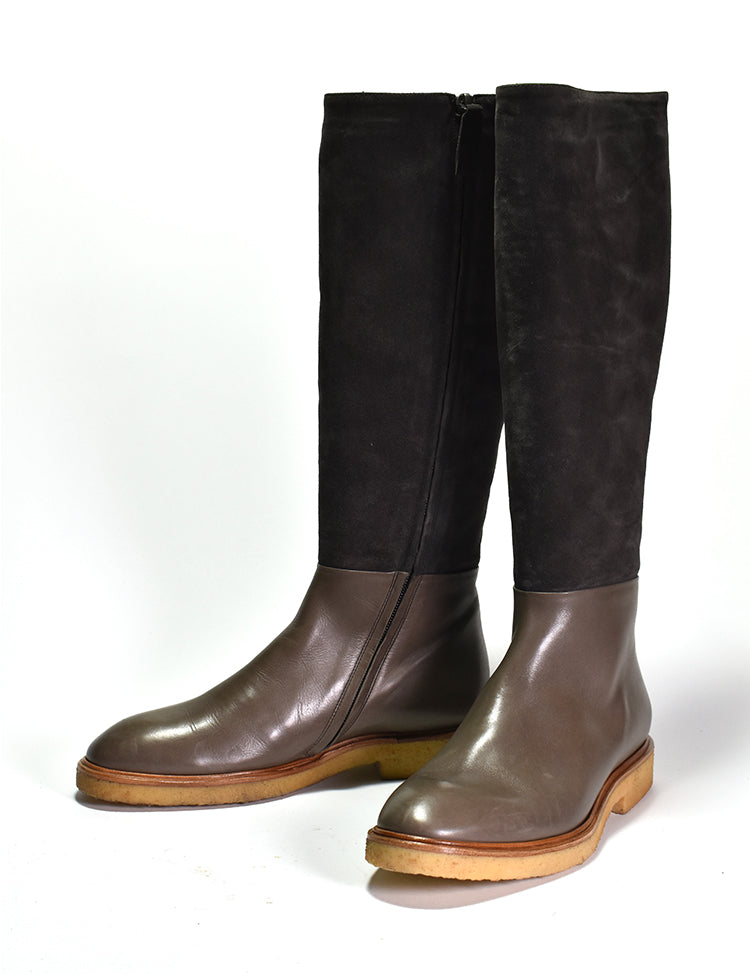 Pair of brown and black knee high boots
