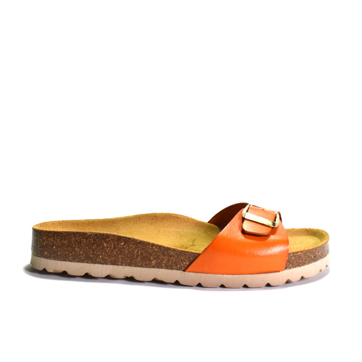 Orange sandal with a brown sole on a white background