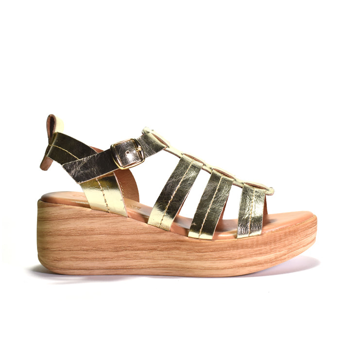 Wooden-look sandal with gold straps on a white background