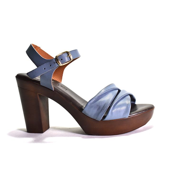 Blue sandal with wooden heel on a white background