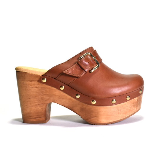 Brown leather clog with wooden sole on a white background