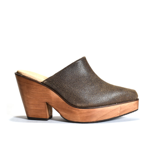 A single women's clog-style mule shoe with a dark brown textured leather upper and a light natural wood platform and block heel, shown from the side on a white background.