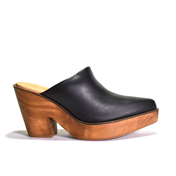 Black clog shoe with wooden sole on a white background