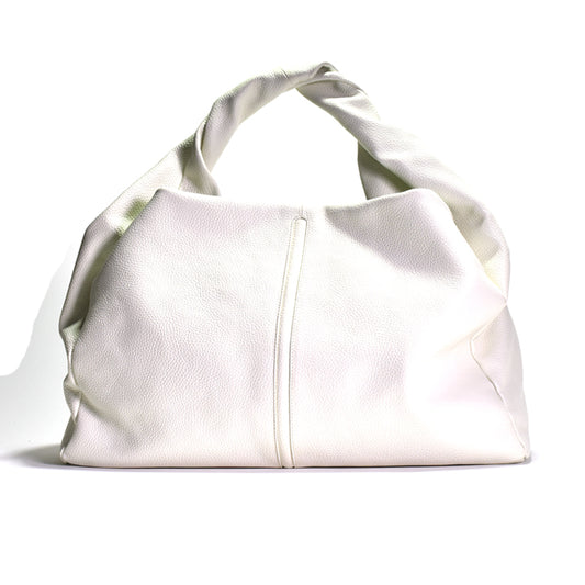 A white shoulder tote bag made of Italian pebbled leather with a cotton lining, featuring a silver colored hardware closure