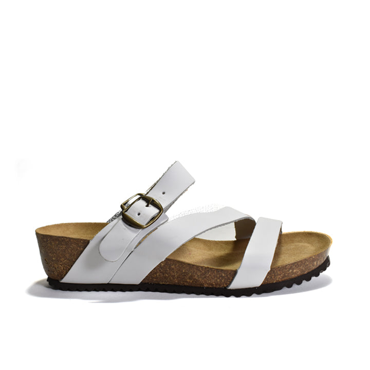 White sandal with a brown insole on a white background