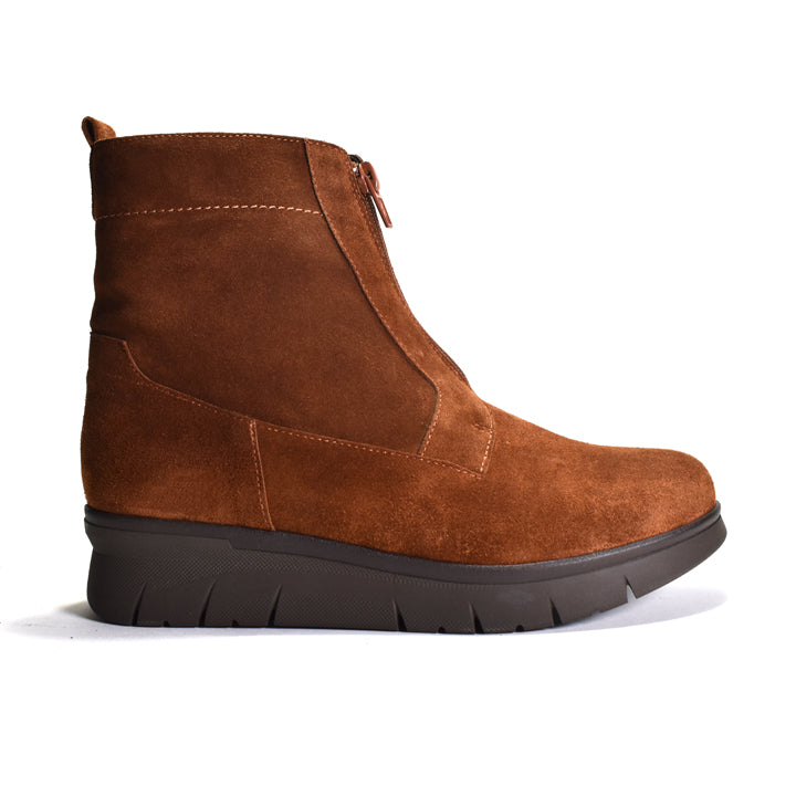 Brown suede ankle boot on a white background