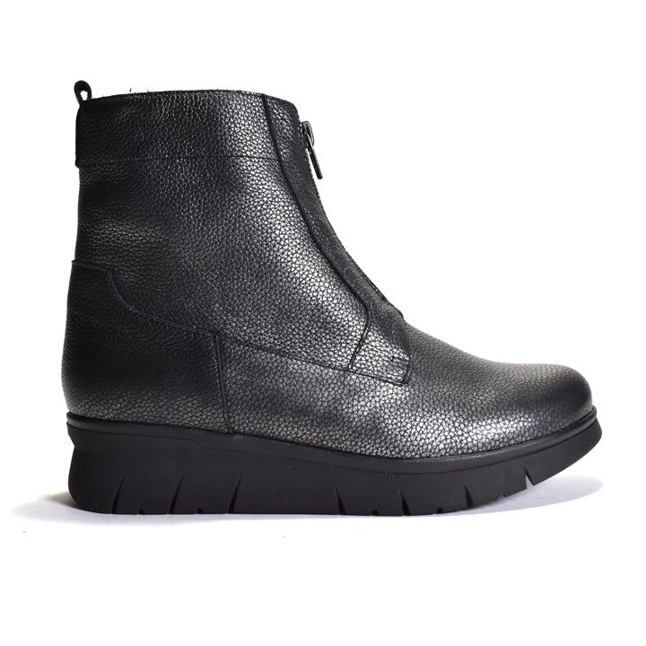 Black leather ankle boot on a white background