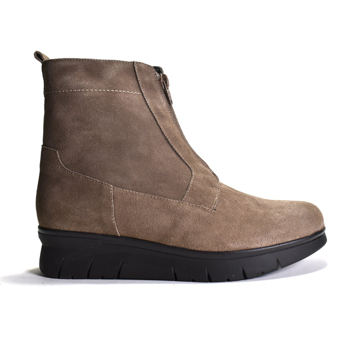 Brown suede ankle boot on a white background