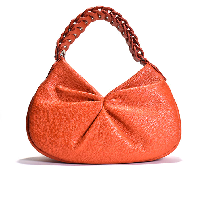 An orange leather shoulder hobo bag with a leather chain link handle.