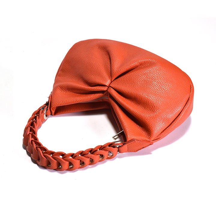 An orange leather shoulder hobo bag with a leather chain link handle.