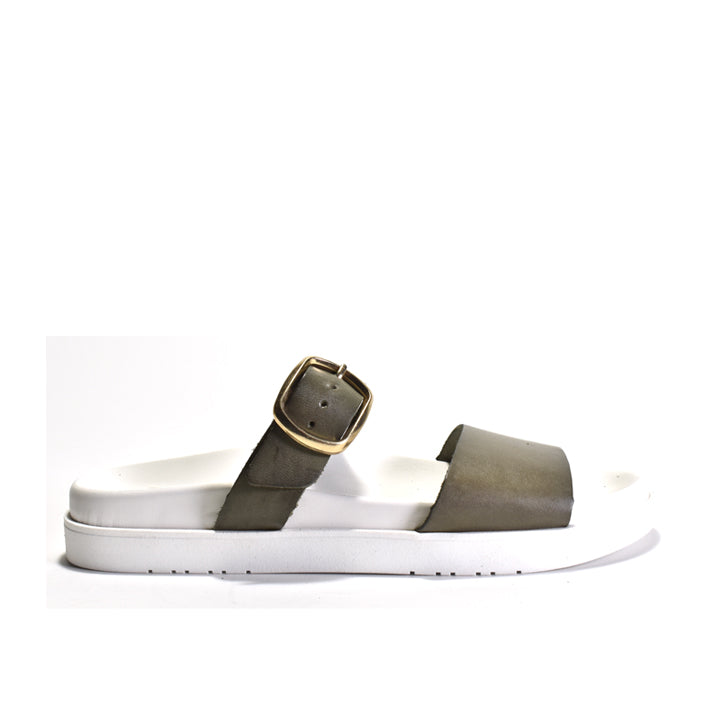 Sandal with a gold buckle on a white background