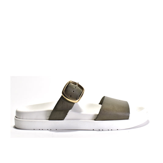 Sandal with a gold buckle on a white background