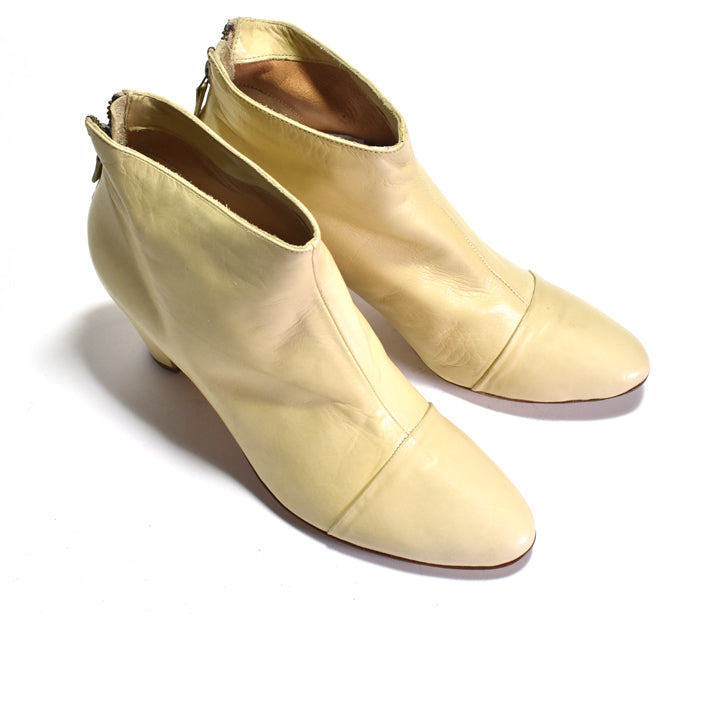 Pair of yellow heeled boots