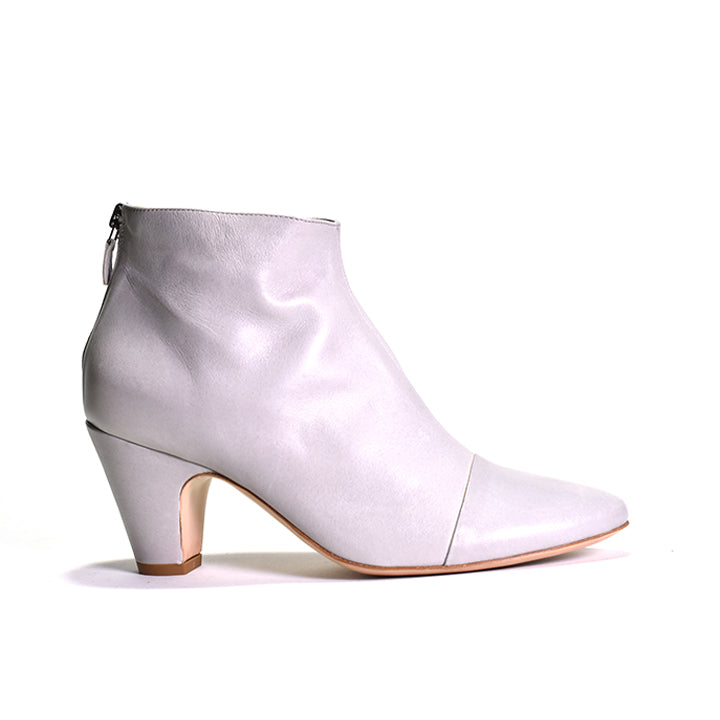 white heeled boot