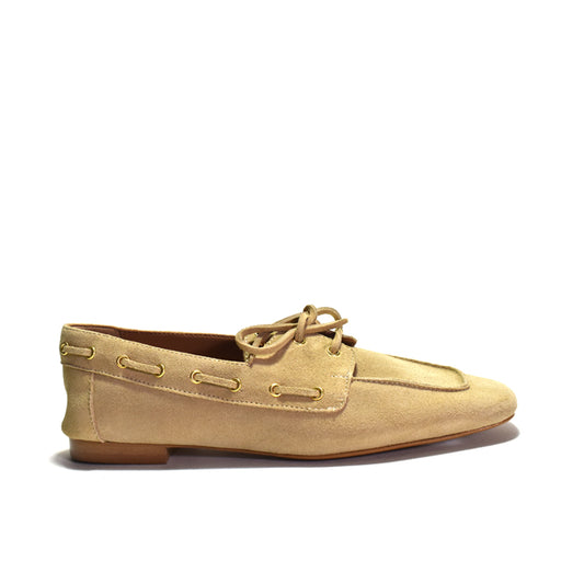 Beige loafer shoe on a white background