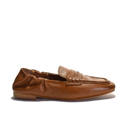 Brown leather loafer on a white background