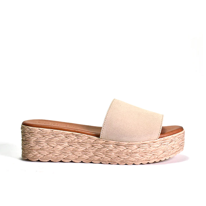 Simple beige suede upper on a rounded toed textured platform