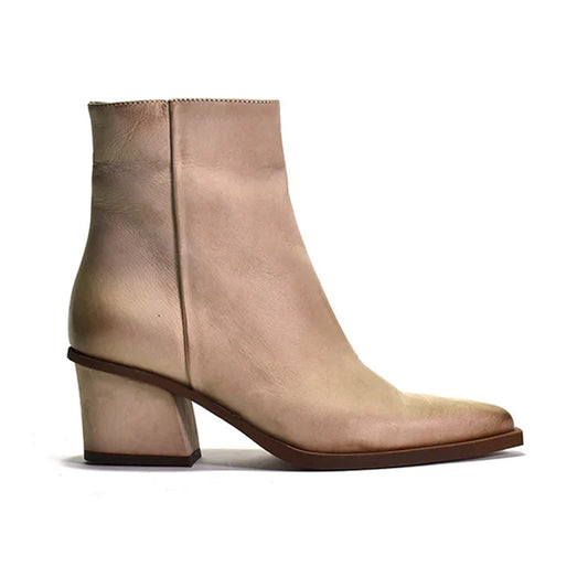 beige Western-style ankle bootie with a wrapped heel, visible zipper, and nubuck upper material.