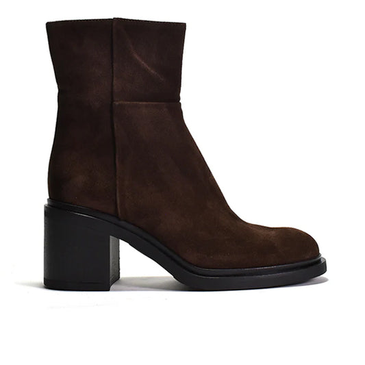 A brown suede ankle boot with a rubber heel and inside zipper