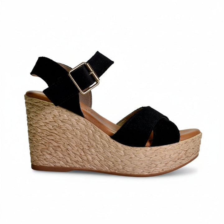 Black wedge sandal with jute-look sole on a white background