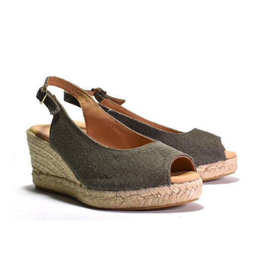 A grey canvas espadrille wedge sandal with a jute wrapped wedge