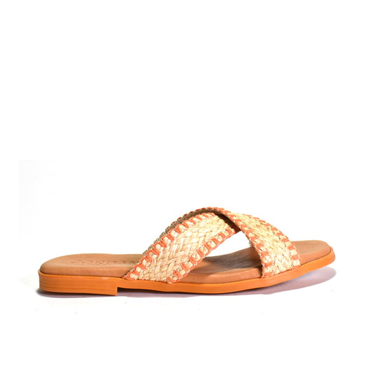Orange sandal with woven design on a white background