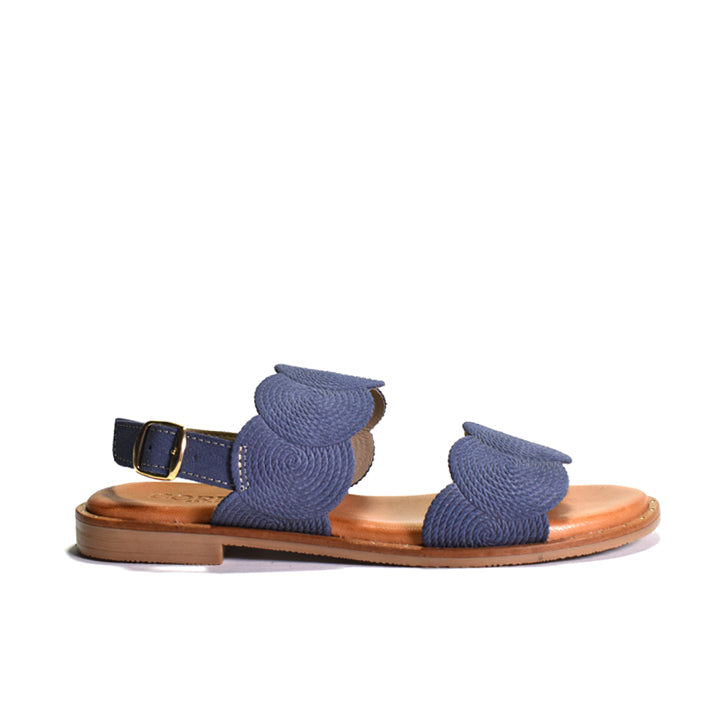 Blue sandal with a wooden sole on a white background