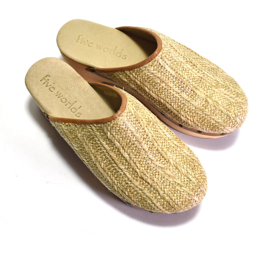 Pair of textured clogs with 'five worlds' branding on a white background