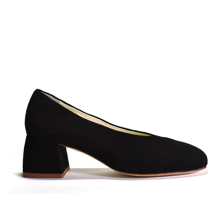 Black suede with a block heel on a light gray background