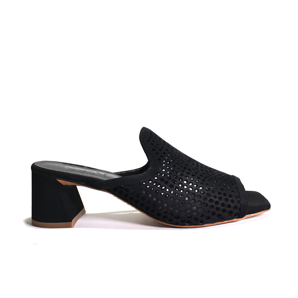 Black perforated mule shoe on a white background