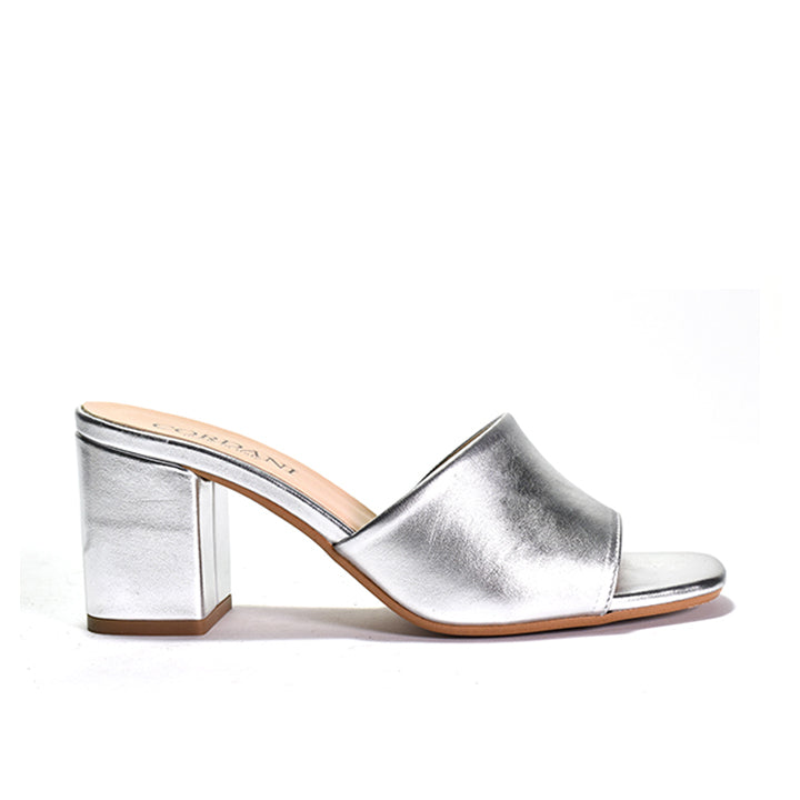 silver suede mule sandal with a wrapped block heel and an open toe