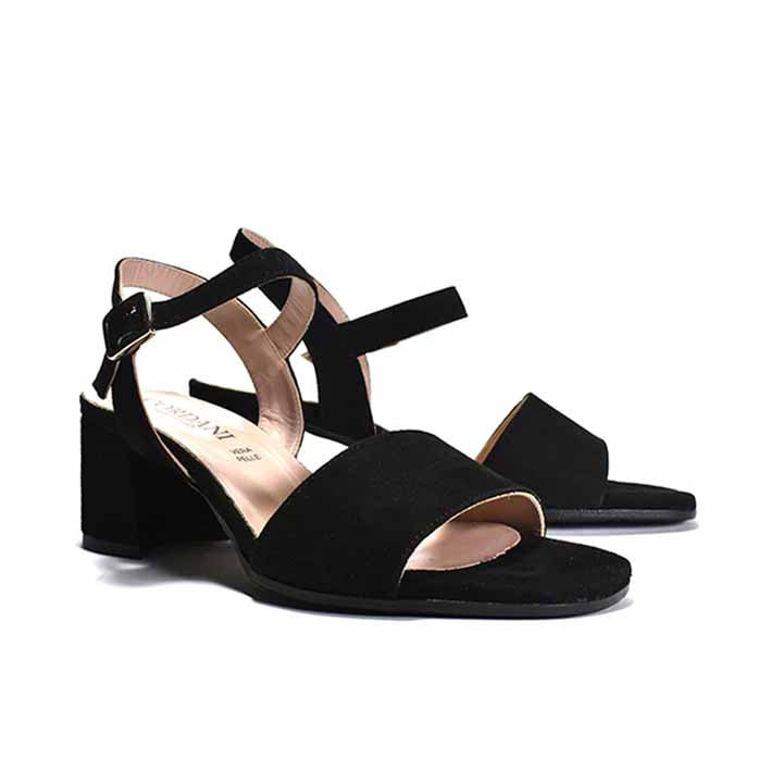 Black sandal with a wrapped block heel, adjustable metal buckle, and a leather lining.