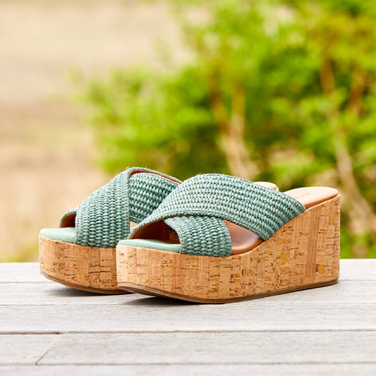 light blue Slip on platform sandal with criss-cross raffia straps slip on a cork wrapped platform