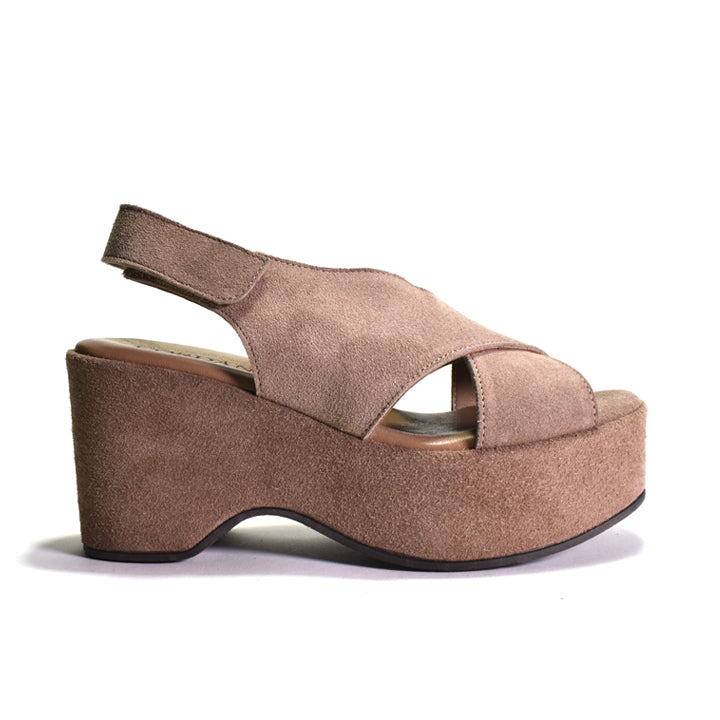Brown suede platform sandal on a white background