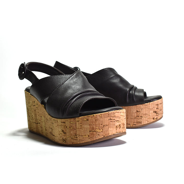 black leather sling back upper and a Cork wrapped wedge